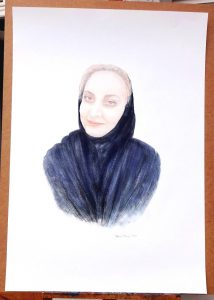 Portrait of a woman with headscarf, drawing on paper